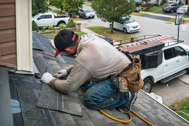 Professional Roofing technician working in Slovan, PA